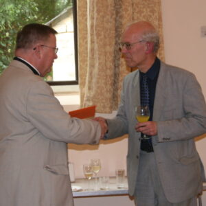 Canon-John-presents-gift-from-parish-420x420